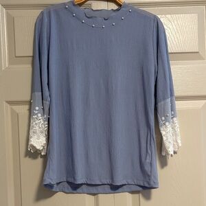 Elegant Blue Women's Top with Lace Sleeves